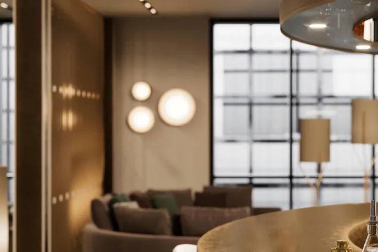 Dining lounge with curved bar, cream stools and tall windows